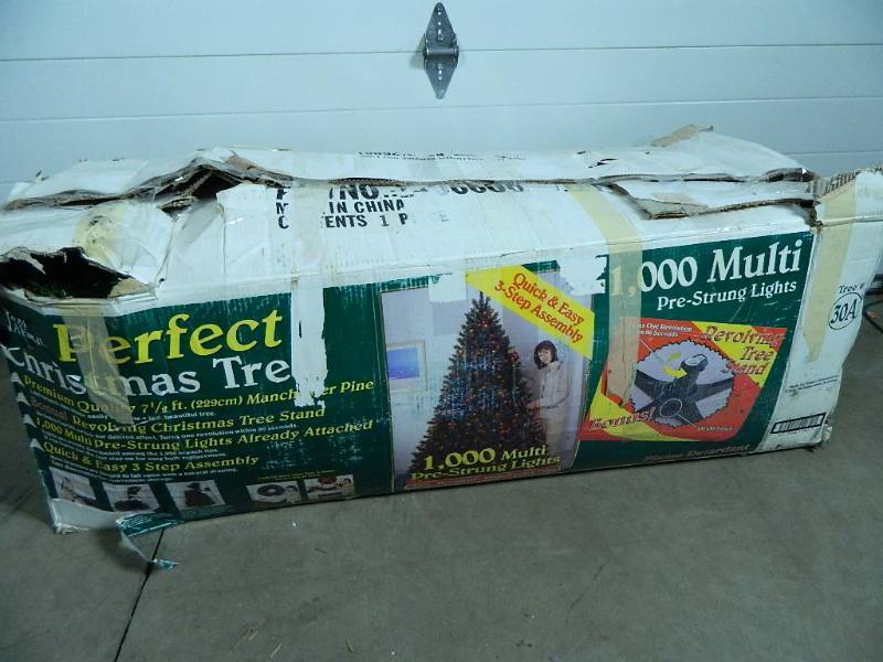 lot 198 image: Pre Lit, Revolving Christmas Tree