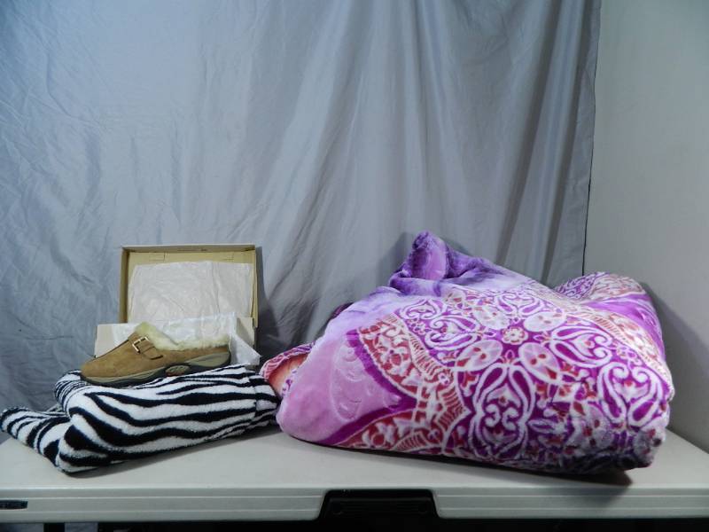 lot 168 image: New Shoes and Blankets