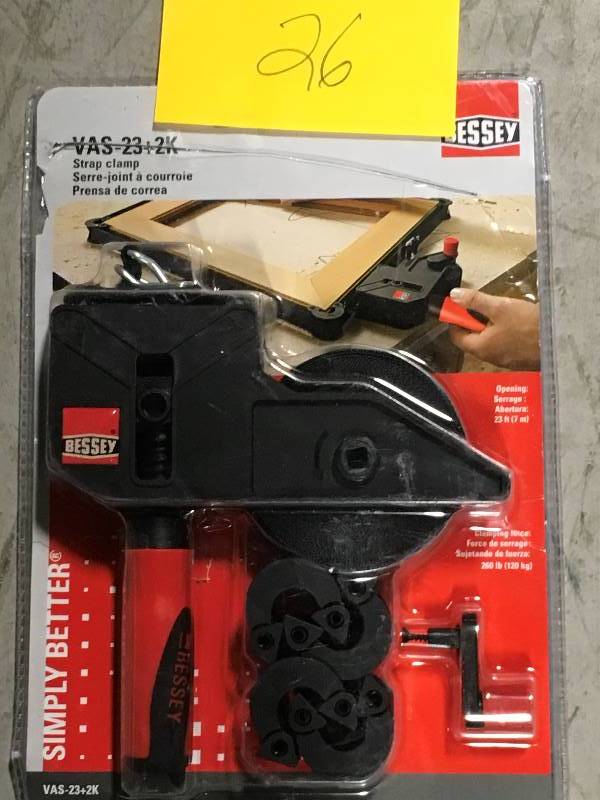 lot 26 image: BESSEY 23 ft. Variable Angle Strap Clamp in like new condition