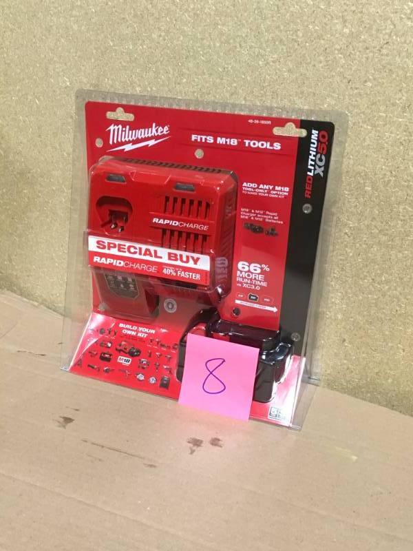 lot 8 image: Milwaukee 48-59-1850 M18 18-Volt Lithium-Ion XC Starter Kit with (1) 5.0Ah Battery and Charger in like new condition