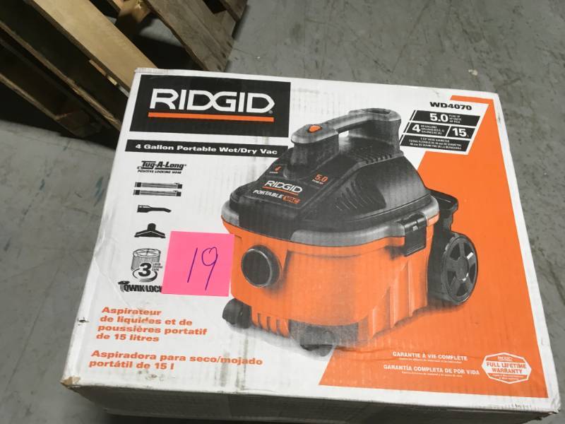 lot 19 image: RIDGID 4 Gal. 5.0-Peak HP Portable WetDry Vacuum USED in working condition