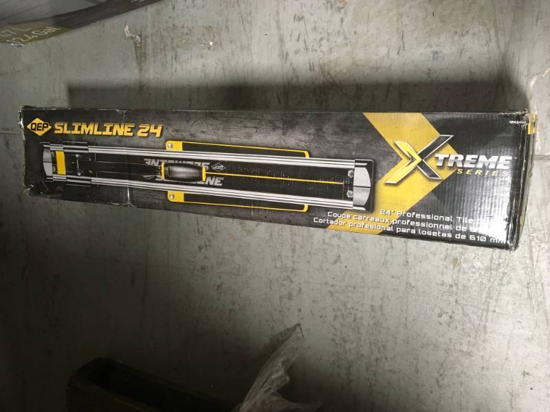 lot 57 image: QEP 24 in. Professional Slimline Tile Cutter in like new condition