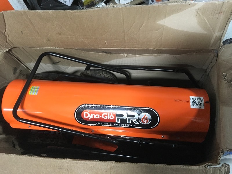 lot 104 image: Dyna-Glo Pro 180K or 220K BTU Forced-Air Kerosene Portable Heater used in working conditions