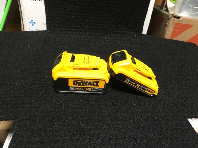 lot 107 image: Set of 1 DEWALT 20-Volt MAX XR Lithium-Ion Premium Battery 4.0Ah and 1 DEWALT 20-Volt MAX Lithium-Ion Compact Battery 2.0Ah in working conditions