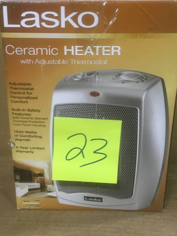 lot 23 image: Lasko 9.2 in. 1500-Watt Electric Portable Ceramic Compact Heater USED