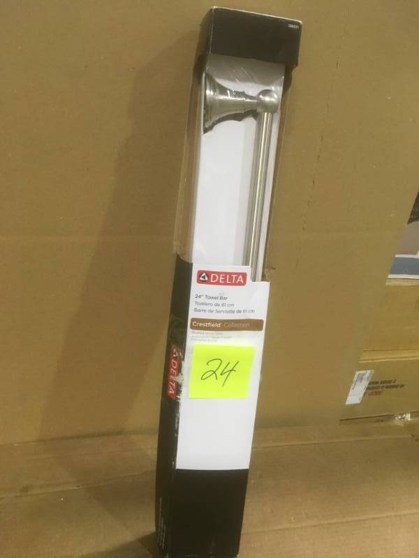 lot 24 image: Delta Crestfield 24 in. Towel Bar in SpotShield Brushed Nickel  in like new condition