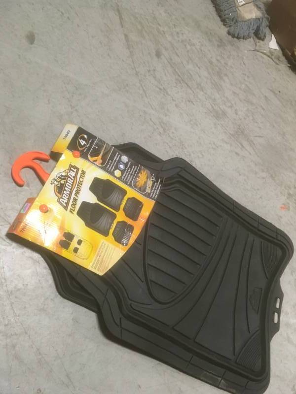 lot 55 image: Armor All Black Heavy Duty Rubber 19 in. x 29 in. Car Mat (4-Piece) SMALL DAMAGE ON TOP