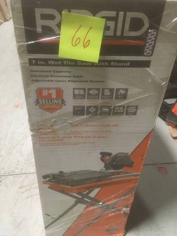 lot 66 image: RIDGID 7 in. Tile Saw with Stand in good condition