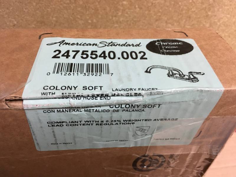 lot 37 image: American Standard Colony Soft 4 in. 2-Handle Low Arc Laundry Faucet in Polished Chrome with Hose End  in like new condition