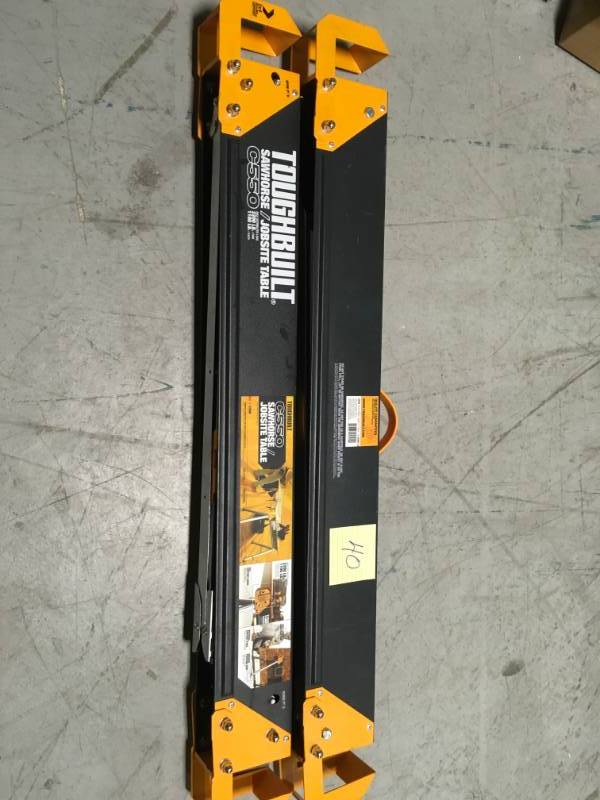 lot 40 image: TOUGHBUILT 42.4 in. W x 28.8 in. H Steel Sawhorse and Jobsite Table  1100 lb. Capacity  in like new condition