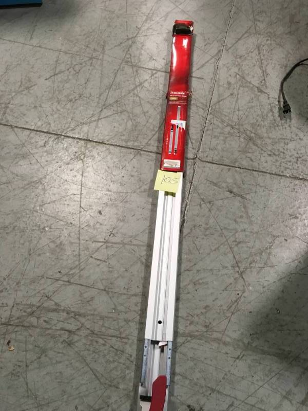 lot 105 image: Husky 100 in. Cutting Guide  in like new condition