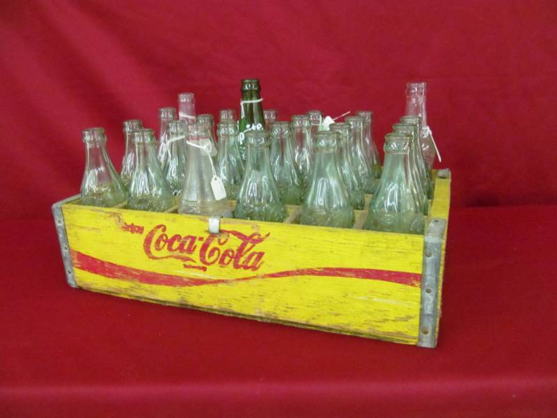 lot 72 image: coca cola case ,bottles, and some others