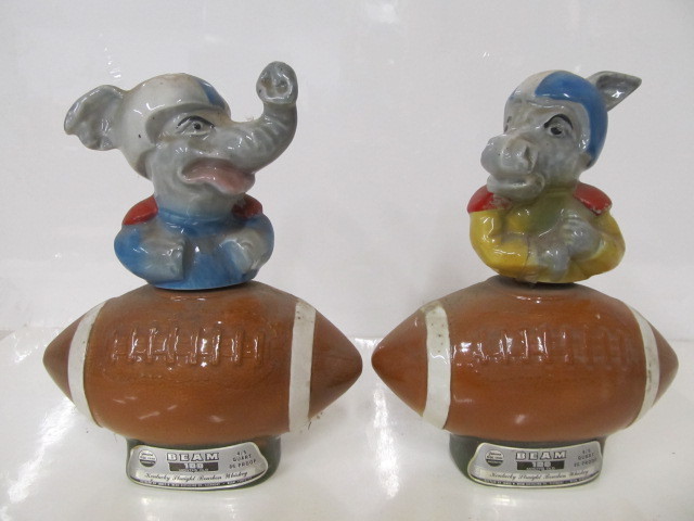 lot 38 image: Matching Pair of Vintage Political Football Whiskey Decanters