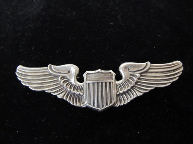 lot 62 image: Large Sterling Military Flying Wings