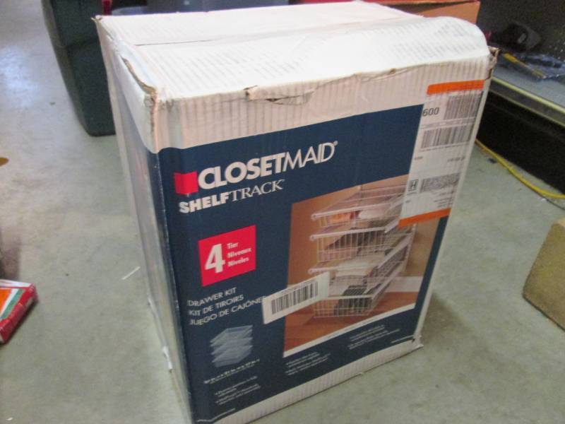 lot 12 image: Closet Maid Shelf Track 4-Drawer Ki...