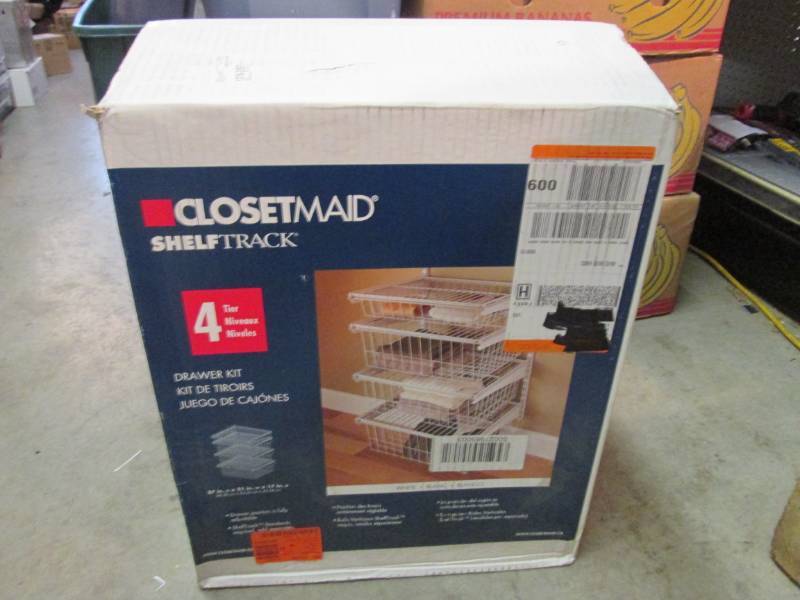 lot 14 image: Closet Maid Shelf Track 4-Drawer Ki...