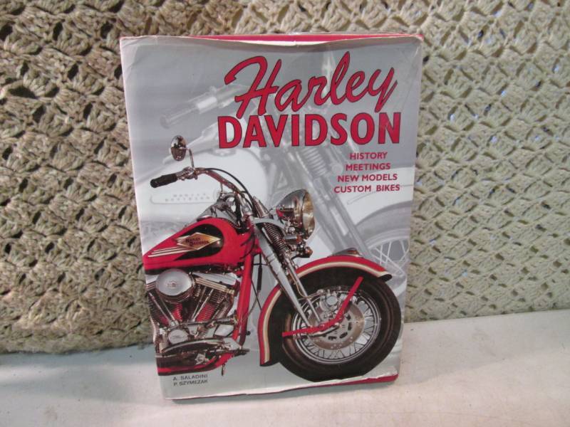 lot 103 image: Large Hard Cover Harley Davidson Bo...