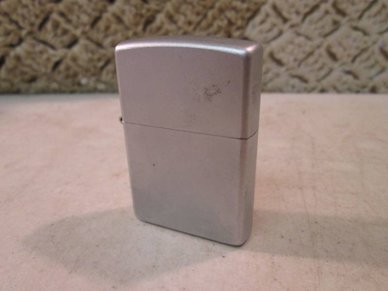 lot 173 image: Zippo Lighter Looks unused.  FS...