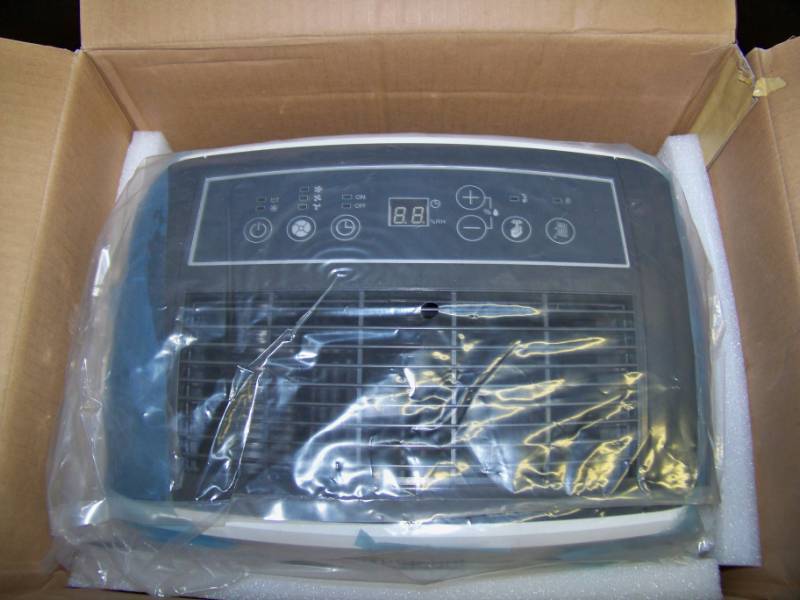 lot 102 image: Whirlpool, Energy Star, 70-Pint Dehumidifier with Built-In Pump in Original Box