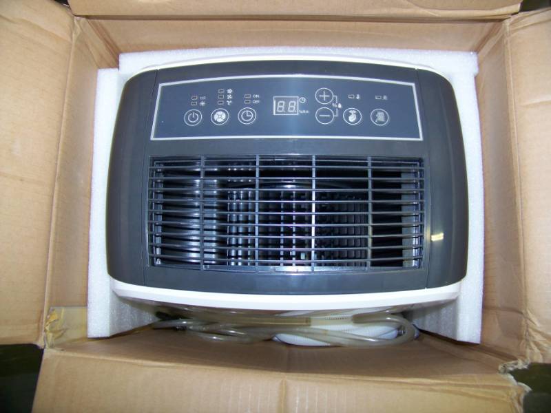lot 103 image: Whirlpool, Energy Star, 70-Pint Dehumidifier with Built-In Pump in Original Box