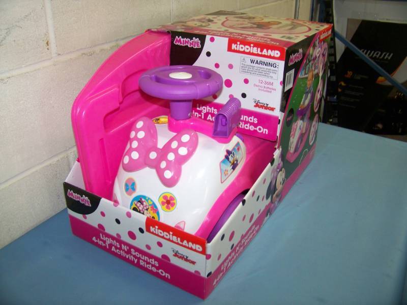 lot 114 image: KiddieLand, Minnie Mouse (Disney), Lights and Sounds 4-in-1 Activity Ride-On Cart in Original Box