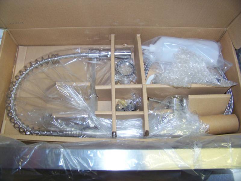 lot 78 image: American Standard, Culver Welded Kitchen Sink and Semi-Pro Faucet Package - NEW in Original, Open Box