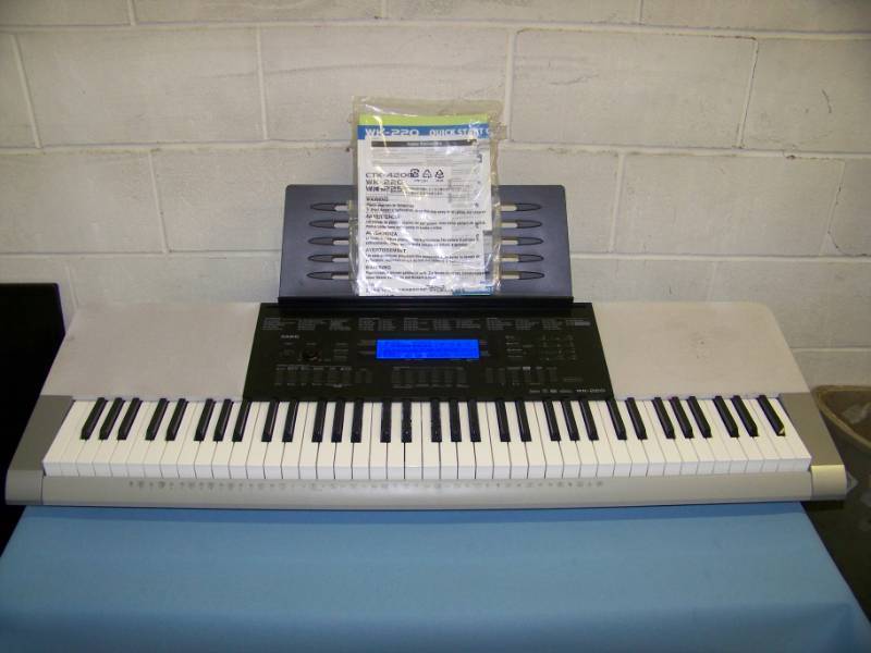 lot 38 image: Casio, WK-220, Electronic Keyboard with Keyboard Stand and Piano Bench - all in Original Boxes