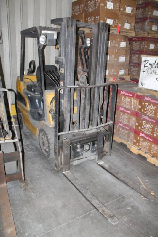 lot 1 image: Caterpillar C5000 Fork Lift with built-in Mettler Toledo scale