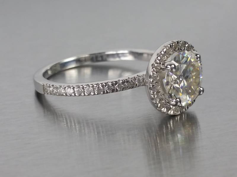 lot 8 image: 1 Ct Moissanite and Diamond Halo Estate Ring in 14k White Gold