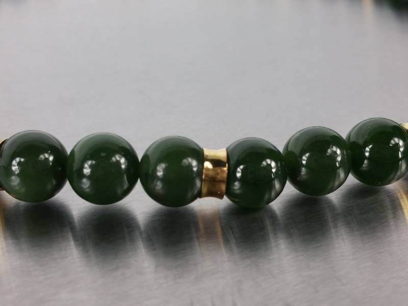 lot 9 image: High End Designer Jade Estate Necklace with 18k Yellow Gold Accents