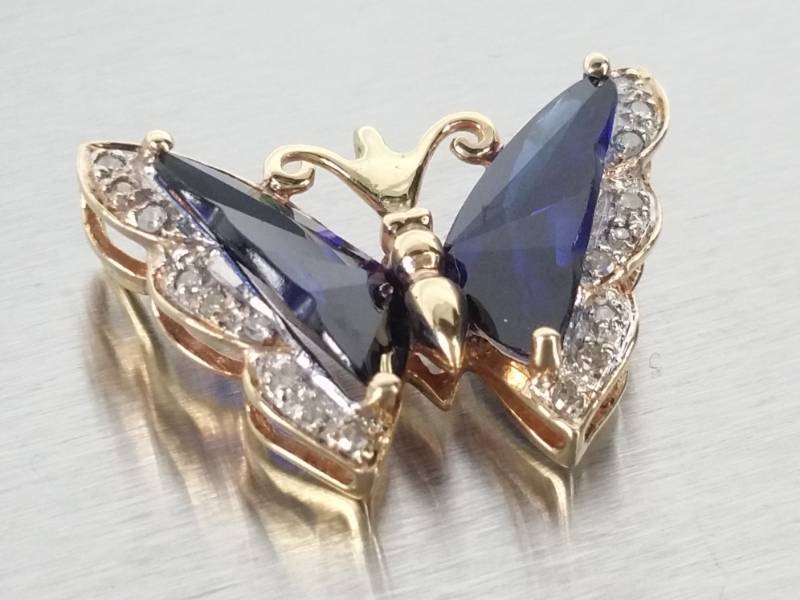 lot 44 image: Sapphire and Diamond Butterfly Slide Pendant in Yellow Gold