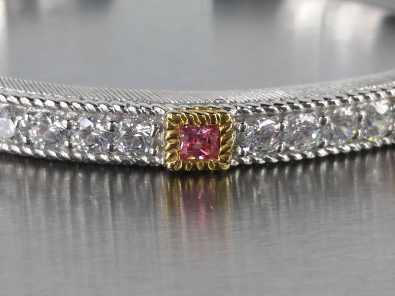 lot 74 image: Judith Ripka Spring Loaded Multi-Colored Stone Estate Bangle in Sterling Silver