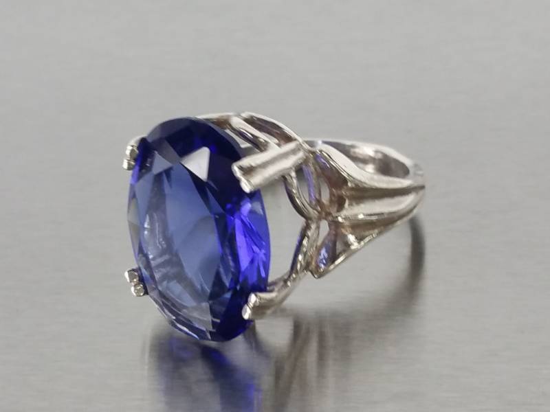 lot 75 image: 12CT Oval Tanzanite Estate Ring in Sterling Silver