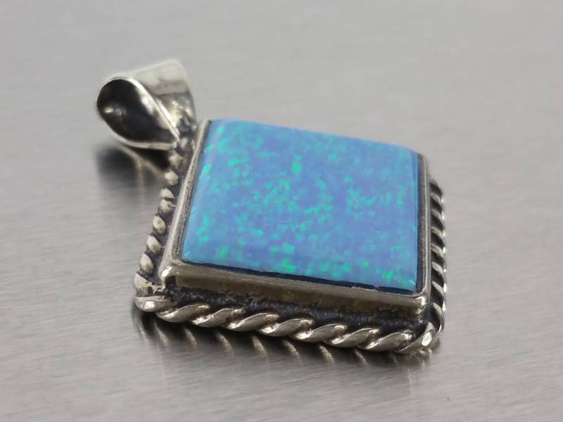lot 83 image: Beautiful Opal Pendant in Sterling Silver
