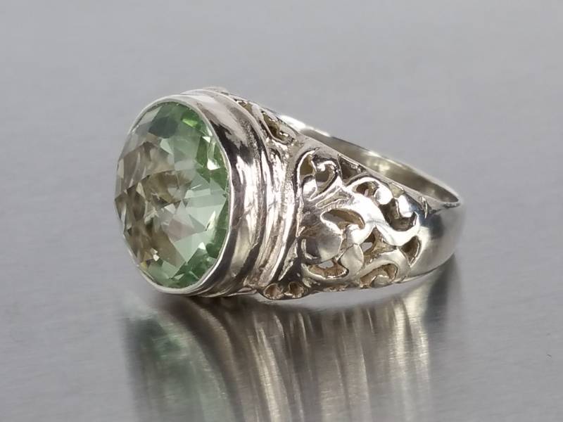 lot 89 image: 11CT Natural Peridot Estate Ring in Sterling Silver