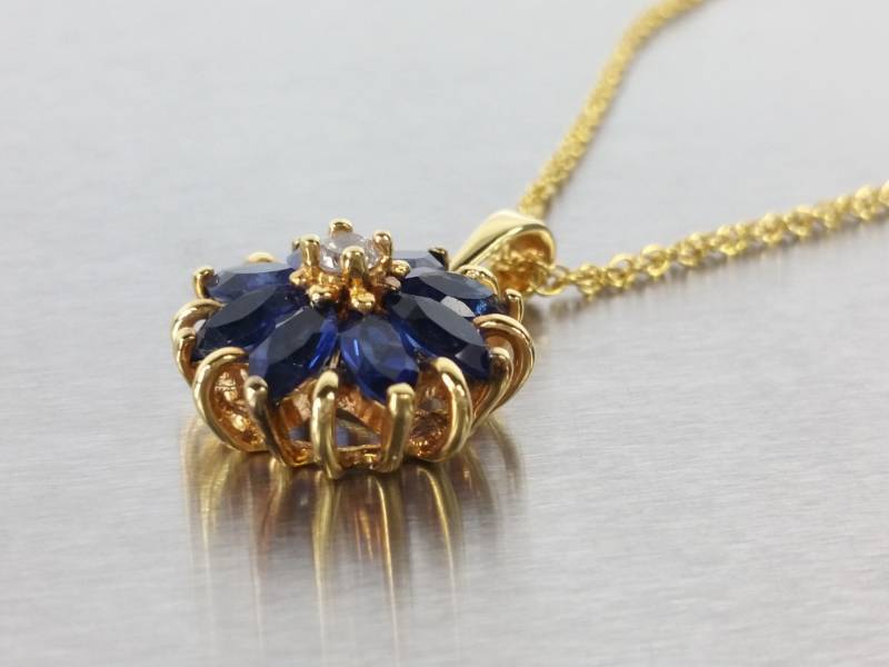 lot 107 image: Sapphire Pendant and Chain in Sterling Silver