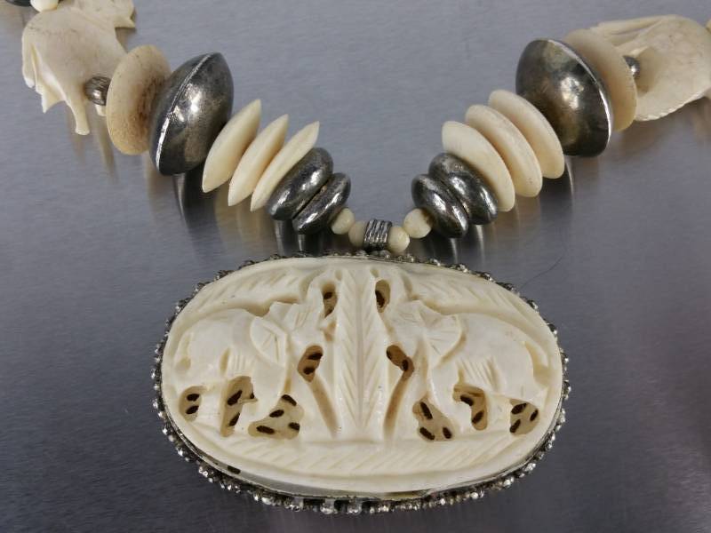 lot 123 image: Elephant Motif Carved Necklace