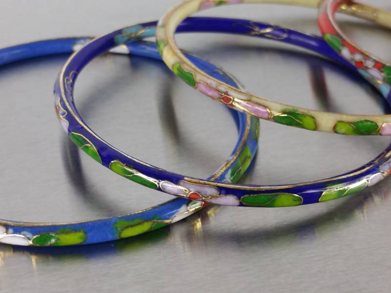 lot 128 image: (6) Hand Painted Bangels Flower Motif