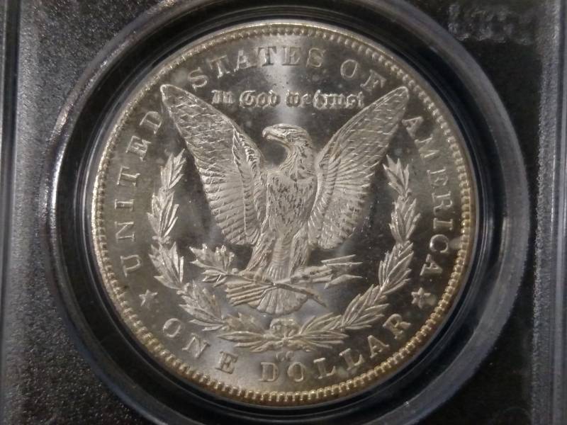 lot 5 image: 1884 CC PCGS MS63 Morgan Silver Dol...