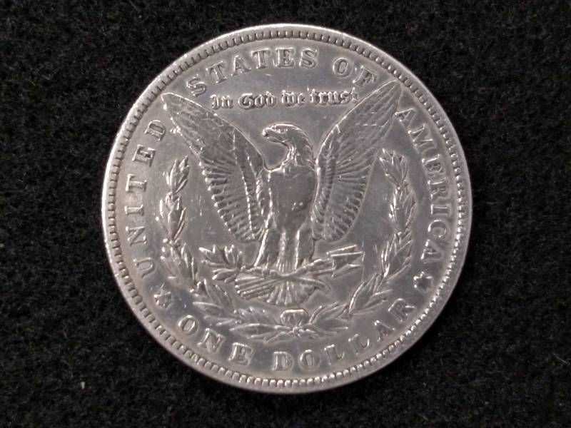 lot 6 image: 1886 Morgan Silver Dollar...