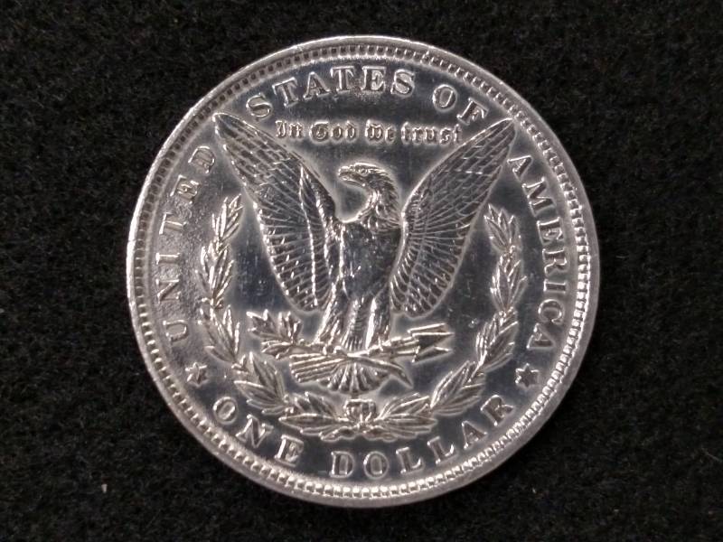 lot 7 image: 1890 Morgan Silver Dollar...
