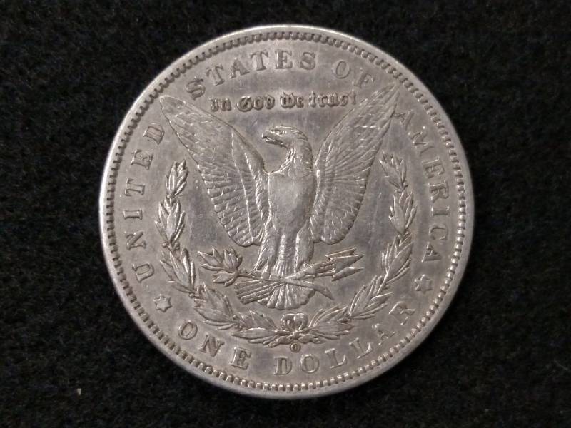 lot 9 image: 1899 O Morgan Silver Dollar...