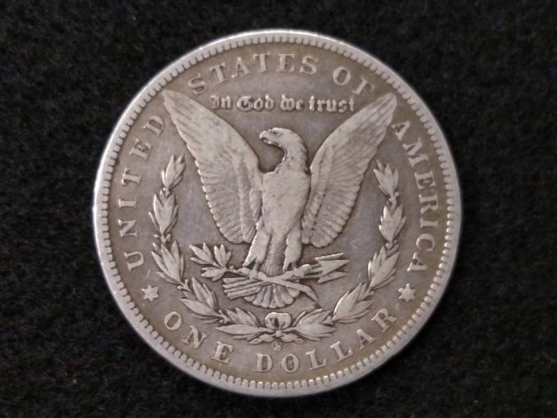 lot 11 image: 1899 S Morgan Silver Dollar...