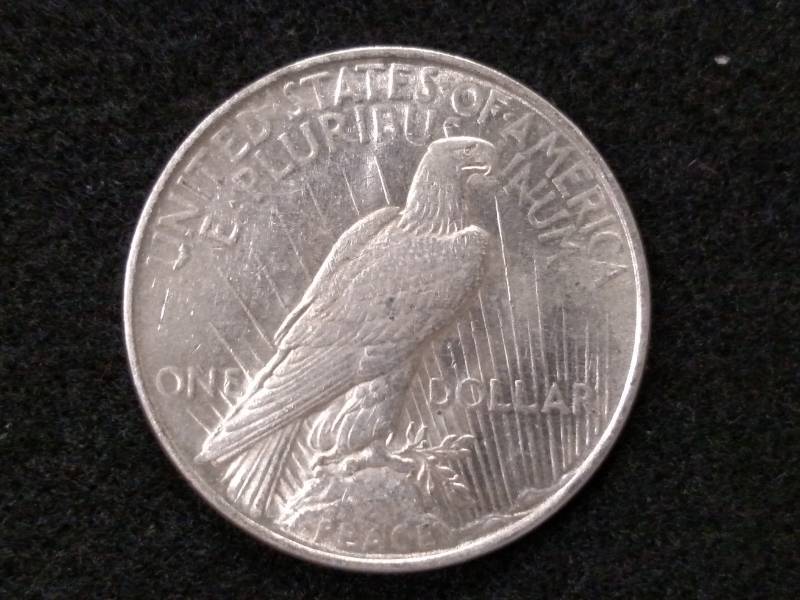 lot 23 image: 1922 Peace Silver Dollar...