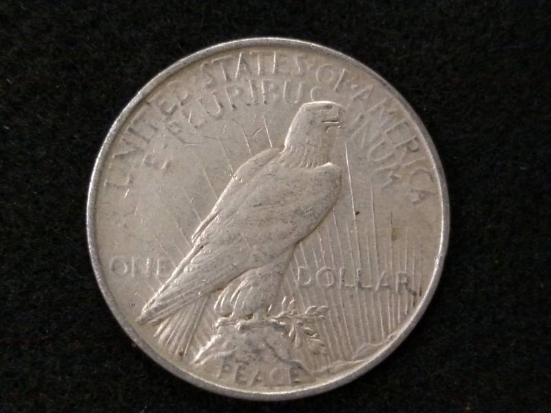 lot 27 image: 1922 D Peace Silver Dollar...
