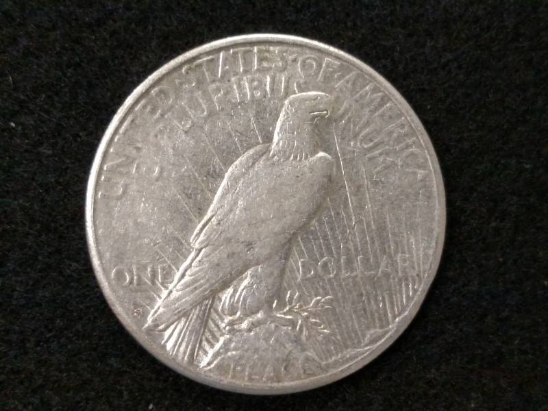 lot 30 image: 1922 S Peace Silver Dollar...
