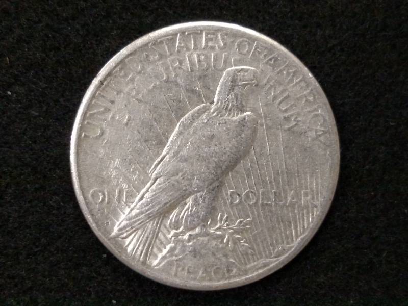 lot 31 image: 1922 S Peace Silver Dollar...