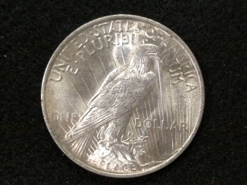 lot 32 image: 1923 Peace Silver Dollar...