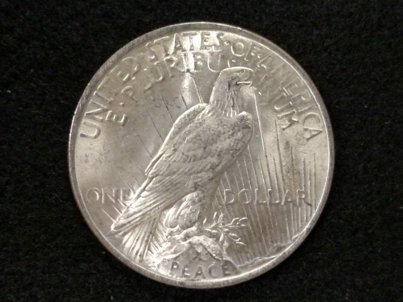 lot 33 image: 1923 Peace Silver Dollar...