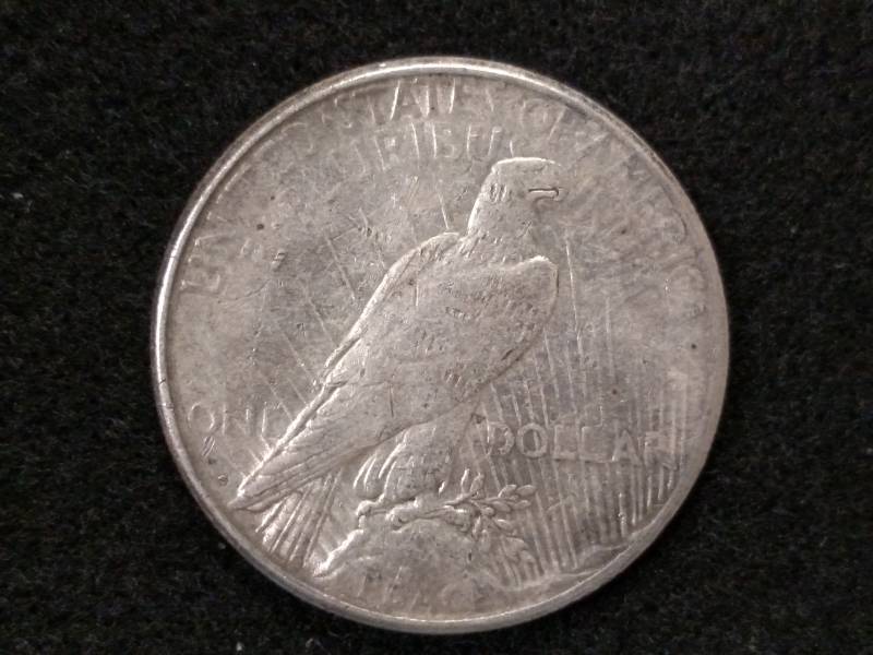 lot 40 image: 1923 S Peace Silver Dollar...